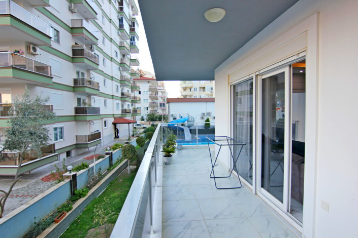 Двухкомнатная квартира 1+1 в комплексе с инфраструктурой в Махмутлар, 65 м2 - Ракурс 20