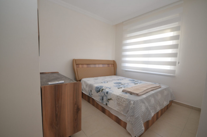 Двухкомнатная квартира с новой мебелью в Махмутларе, 60 м2 - Ракурс 10