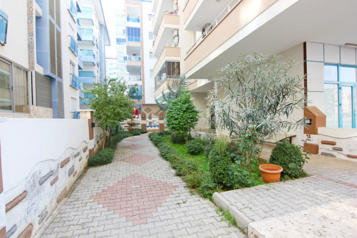 Двухкомнатная квартира в центре района Махмутлар, 70 м2 - Ракурс 2