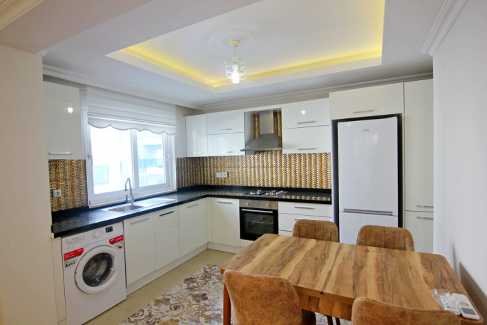 Двухкомнатная квартира в центре района Махмутлар, 70 м2 - Ракурс 12