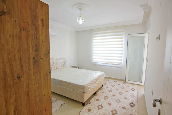 Двухкомнатная квартира в центре района Махмутлар, 70 м2 - Ракурс 20