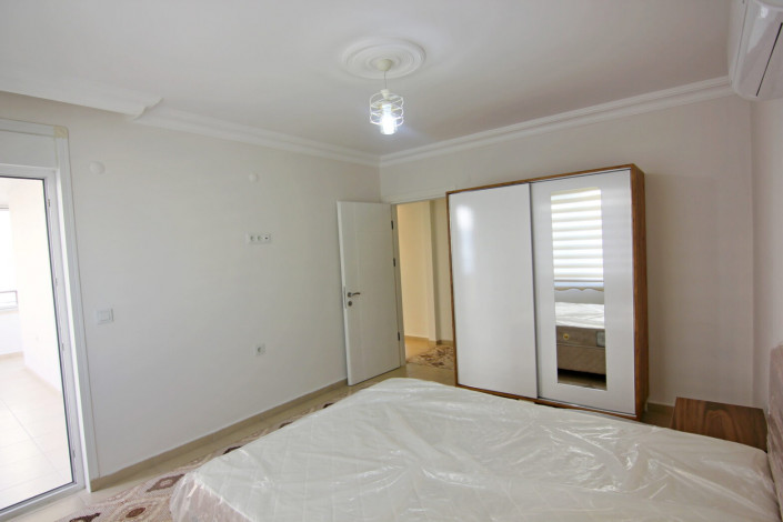 Двухкомнатная квартира в центре района Махмутлар, 70 м2 - Ракурс 21