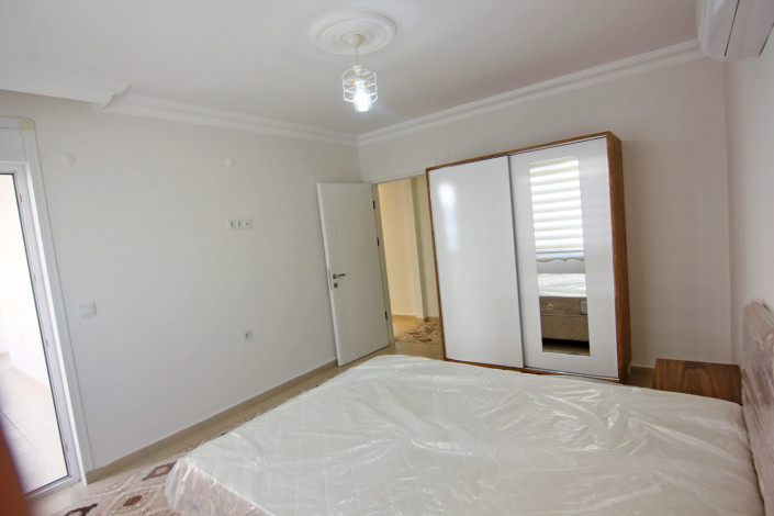 Двухкомнатная квартира в центре района Махмутлар, 70 м2 - Ракурс 22