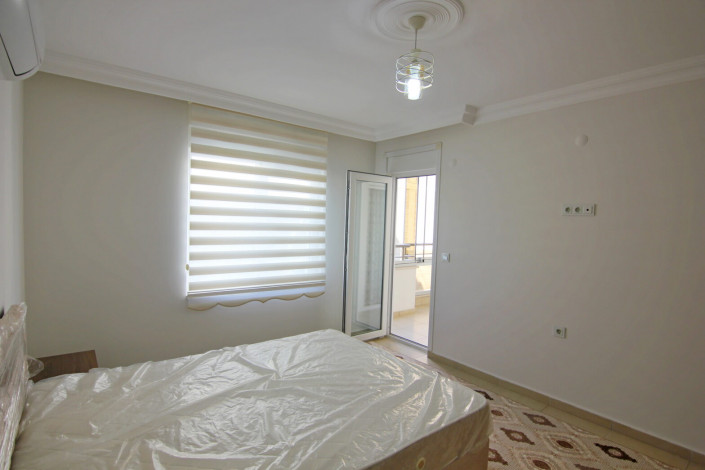 Двухкомнатная квартира в центре района Махмутлар, 70 м2 - Ракурс 23