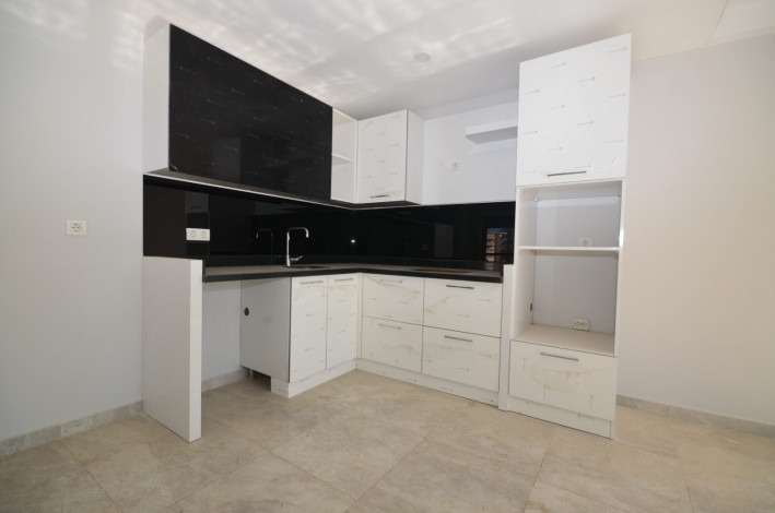 Большая по площади двухкомнатная квартира в Махмутларе, 75 м2 - Ракурс 3