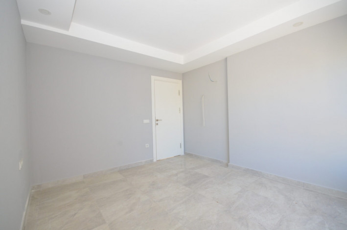 Большая по площади двухкомнатная квартира в Махмутларе, 75 м2 - Ракурс 9