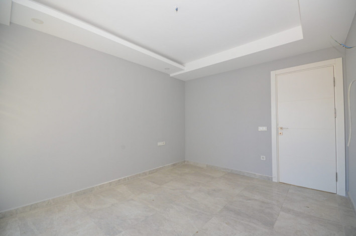 Большая по площади двухкомнатная квартира в Махмутларе, 75 м2 - Ракурс 10