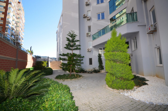 Большая по площади двухкомнатная квартира в Махмутларе, 75 м2 - Ракурс 22