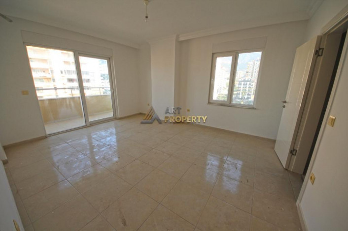 Двухкомнатная квартира на высоком этаже с частичным видом на море в Махмутлар, 70 м2 - Ракурс 2