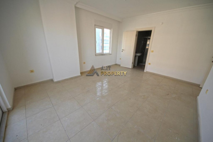 Двухкомнатная квартира на высоком этаже с частичным видом на море в Махмутлар, 70 м2 - Ракурс 3