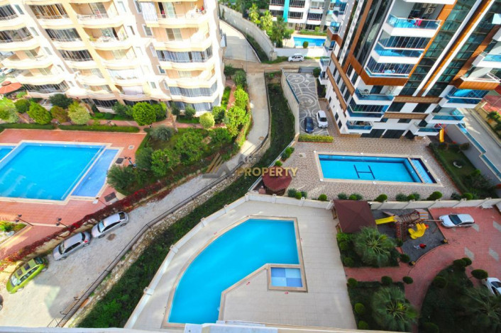 Двухкомнатная квартира на высоком этаже с частичным видом на море в Махмутлар, 70 м2 - Ракурс 8