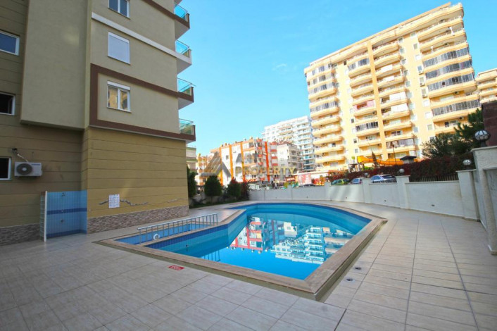 Двухкомнатная квартира на высоком этаже с частичным видом на море в Махмутлар, 70 м2 - Ракурс 9