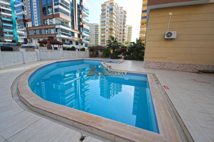 Двухкомнатная квартира на высоком этаже с частичным видом на море в Махмутлар, 70 м2 - Ракурс 10