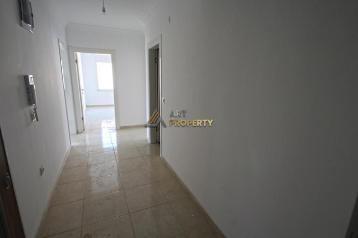 Двухкомнатная квартира на высоком этаже с частичным видом на море в Махмутлар, 70 м2 - Ракурс 13