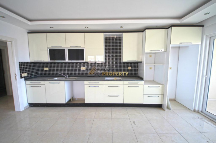 Двухкомнатная квартира на высоком этаже с частичным видом на море в Махмутлар, 70 м2 - Ракурс 16