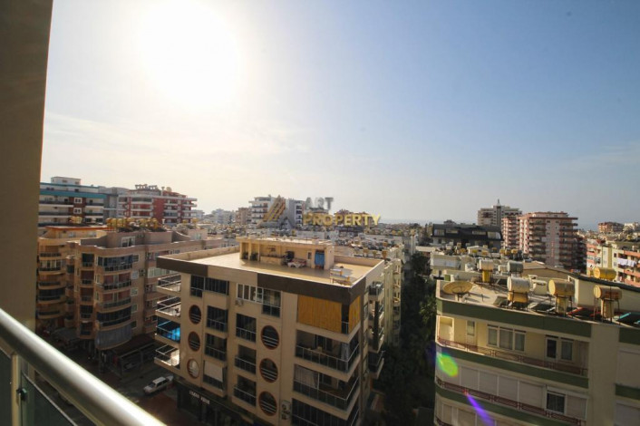 Двухкомнатная квартира на высоком этаже с частичным видом на море в Махмутлар, 70 м2 - Ракурс 17