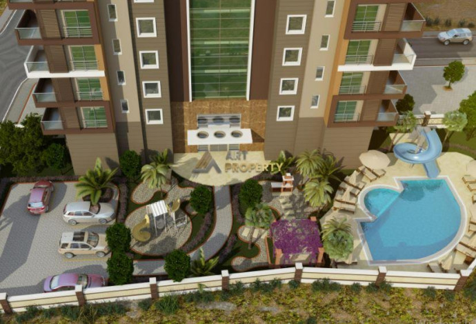 Двухкомнатная квартира на высоком этаже с частичным видом на море в Махмутлар, 70 м2 - Ракурс 18