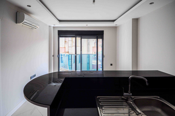 Двухкомнатная квартира в 300 метрах от моря в центре района Оба, 55 м2 - Ракурс 5