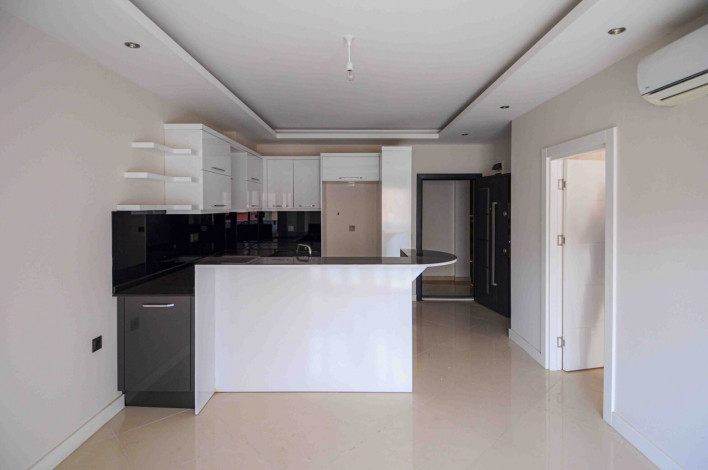 Двухкомнатная квартира в 300 метрах от моря в центре района Оба, 55 м2 - Ракурс 9