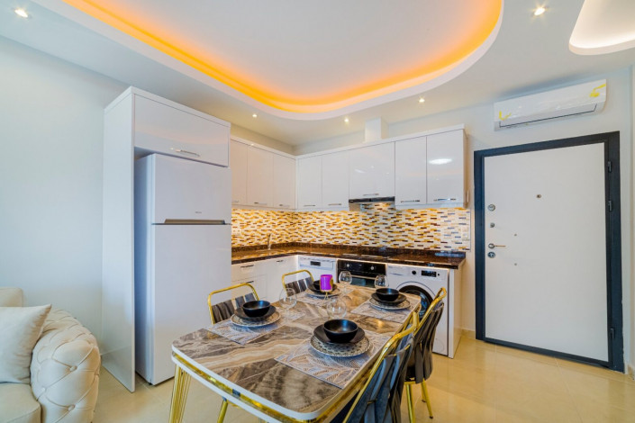 Шикарная двухкомнатная квартира с мебелью вблизи моря в Махмутлар, 60 м2 - Ракурс 4