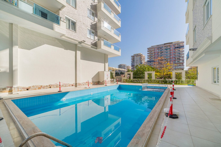 Шикарная двухкомнатная квартира с мебелью вблизи моря в Махмутлар, 60 м2 - Ракурс 11