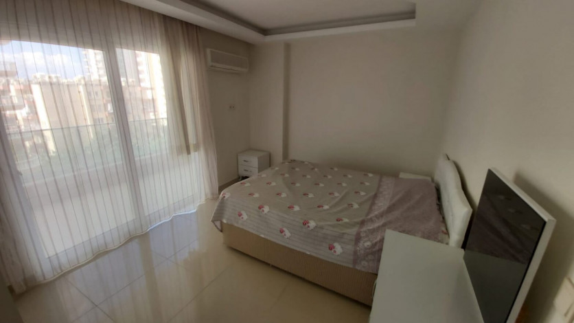 Меблированная двухкомнатная квартира в центре района Махмутлар, 50 м2 - Ракурс 9