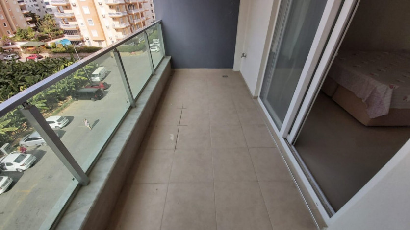 Меблированная двухкомнатная квартира в центре района Махмутлар, 50 м2 - Ракурс 11