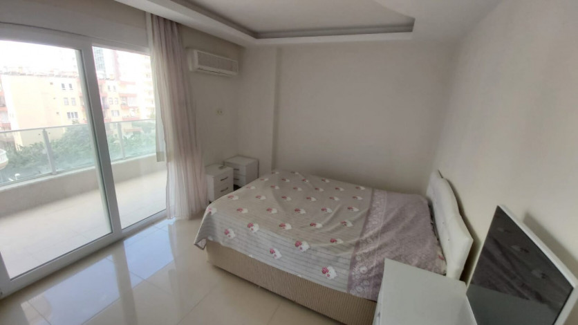 Меблированная двухкомнатная квартира в центре района Махмутлар, 50 м2 - Ракурс 12