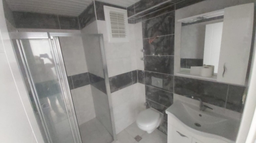 Меблированная двухкомнатная квартира в центре района Махмутлар, 50 м2 - Ракурс 13