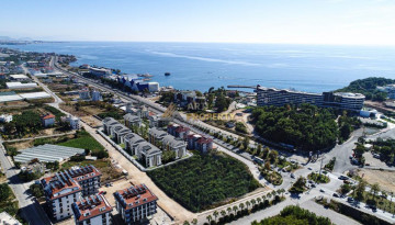 Новый проект для инвестиций в 150 метрах от Средиземного моря в Окурджаларе, от 39 м2 - Ракурс 10
