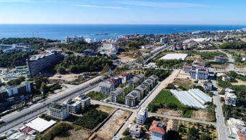 Новый проект для инвестиций в 150 метрах от Средиземного моря в Окурджаларе, от 39 м2 - Ракурс 11