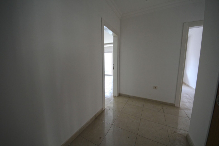 Трехкомнатная квартира в хорошем комплексе в районе Махмутлар, 100 м2 - Ракурс 3