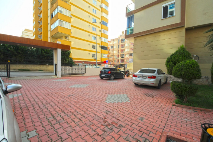 Трехкомнатная квартира в хорошем комплексе в районе Махмутлар, 100 м2 - Ракурс 20