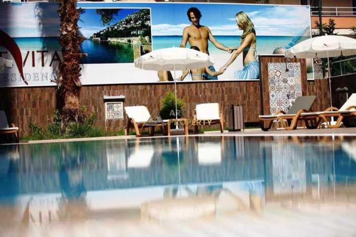 Трехкомнатная квартира с частичным видом на море в люксовом комплексе в Махмутлар, 110 м2 - Ракурс 3