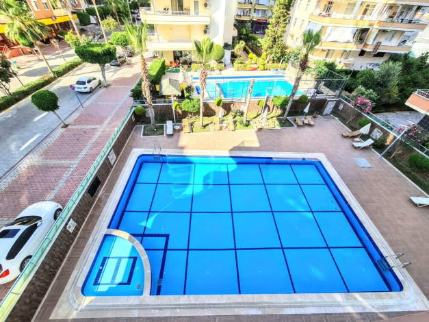 Трехкомнатная квартира с частичным видом на море в люксовом комплексе в Махмутлар, 110 м2 - Ракурс 26