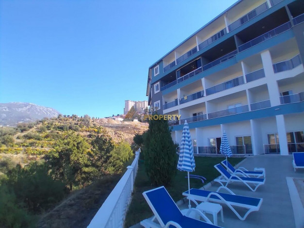 Двухкомнатная квартира в комплексе с инфраструктурой в элитном районе Каргыджак, 55 м2 - Ракурс 2