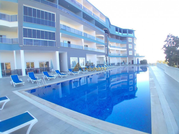 Двухкомнатная квартира в комплексе с инфраструктурой в элитном районе Каргыджак, 55 м2 - Ракурс 3