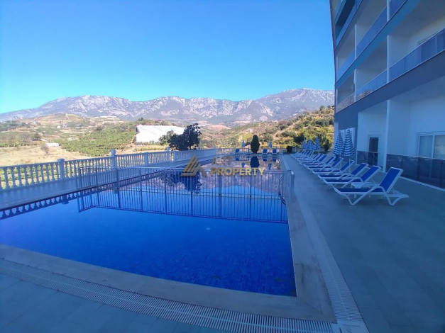 Двухкомнатная квартира в комплексе с инфраструктурой в элитном районе Каргыджак, 55 м2 - Ракурс 22