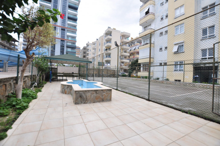 В 200 метрах от моря квартира 2+1 с отдельной кухней, район Махмутлар, 125 м2 - Ракурс 2