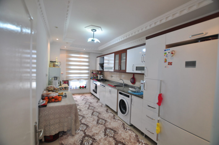 В 200 метрах от моря квартира 2+1 с отдельной кухней, район Махмутлар, 125 м2 - Ракурс 6