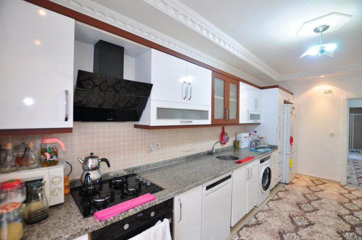 В 200 метрах от моря квартира 2+1 с отдельной кухней, район Махмутлар, 125 м2 - Ракурс 7