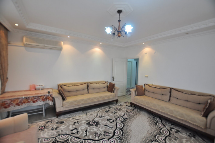 В 200 метрах от моря квартира 2+1 с отдельной кухней, район Махмутлар, 125 м2 - Ракурс 9