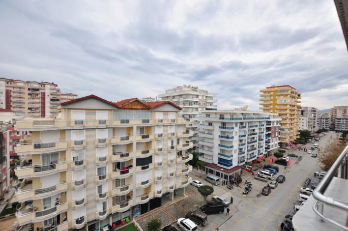 В 200 метрах от моря квартира 2+1 с отдельной кухней, район Махмутлар, 125 м2 - Ракурс 11