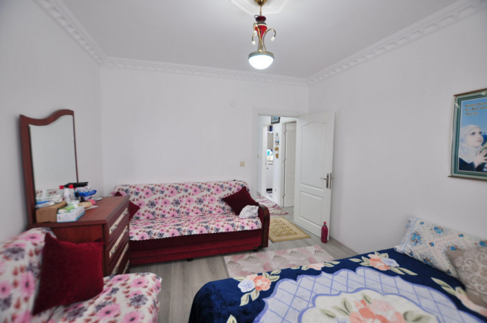 В 200 метрах от моря квартира 2+1 с отдельной кухней, район Махмутлар, 125 м2 - Ракурс 17