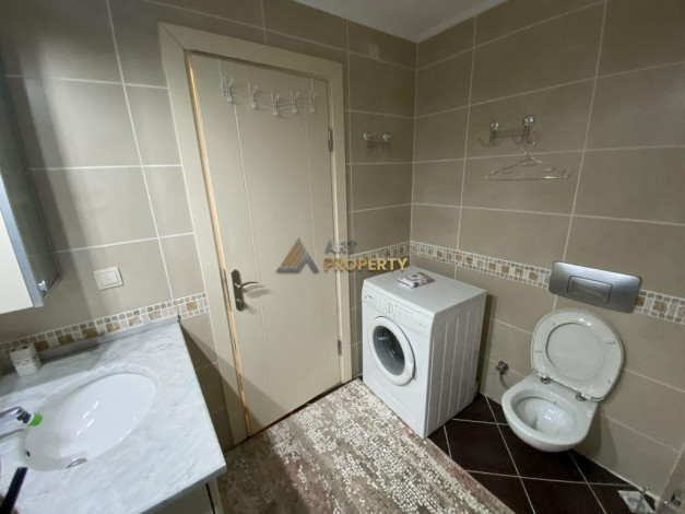 Трехкомнатная квартира в 250 метрах от моря на высоком этаже в Махмутлар, 115 м2 - Ракурс 20