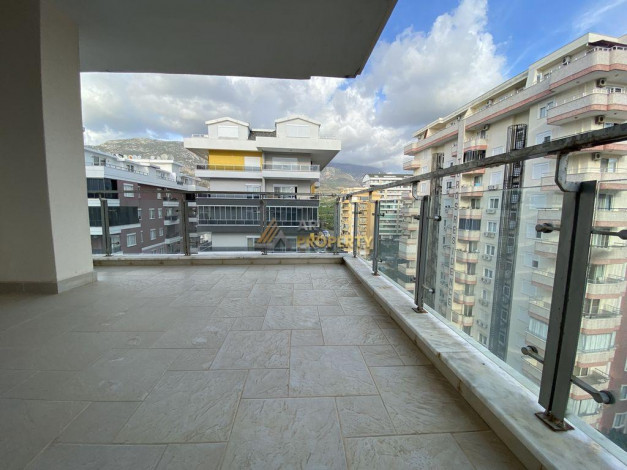 Трехкомнатная квартира в 250 метрах от моря на высоком этаже в Махмутлар, 115 м2 - Ракурс 31