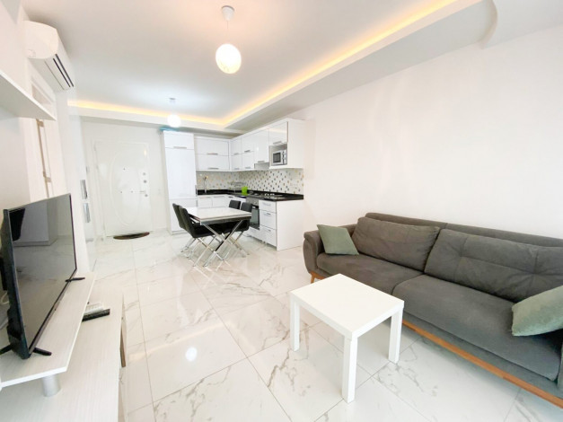 Двухкомнатная квартира в 40 метрах от моря в районе Авсаллар, 60 м2 - Ракурс 8