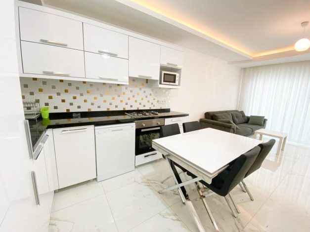 Двухкомнатная квартира в 40 метрах от моря в районе Авсаллар, 60 м2 - Ракурс 10