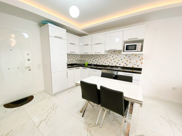 Двухкомнатная квартира в 40 метрах от моря в районе Авсаллар, 60 м2 - Ракурс 11