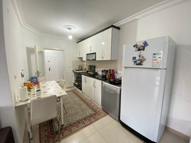 Двухкомнатная квартира в пешей доступности от пляжа в центре района Авсаллар, 90 м2 - Ракурс 10